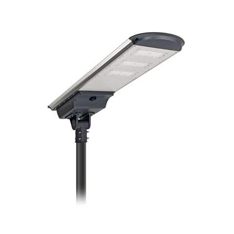 Solar-powered street light with dark gray housing and metal reflective panel mounted on black pole